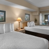 oceanfront guest suite with 2 queen beds at beach colony resort